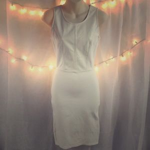 White dress with faux leather top.
